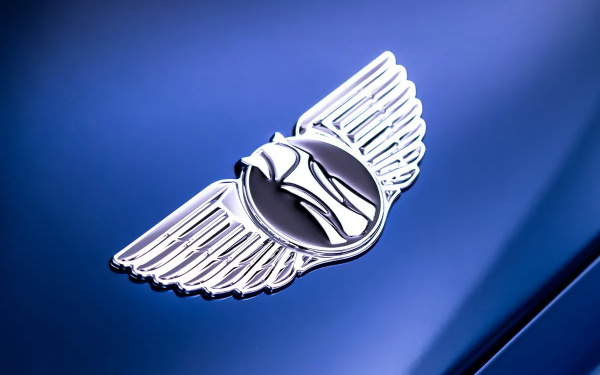 
            Aston Martin подал в суд на Geely из-за похожего логотипа. Сравните их
        